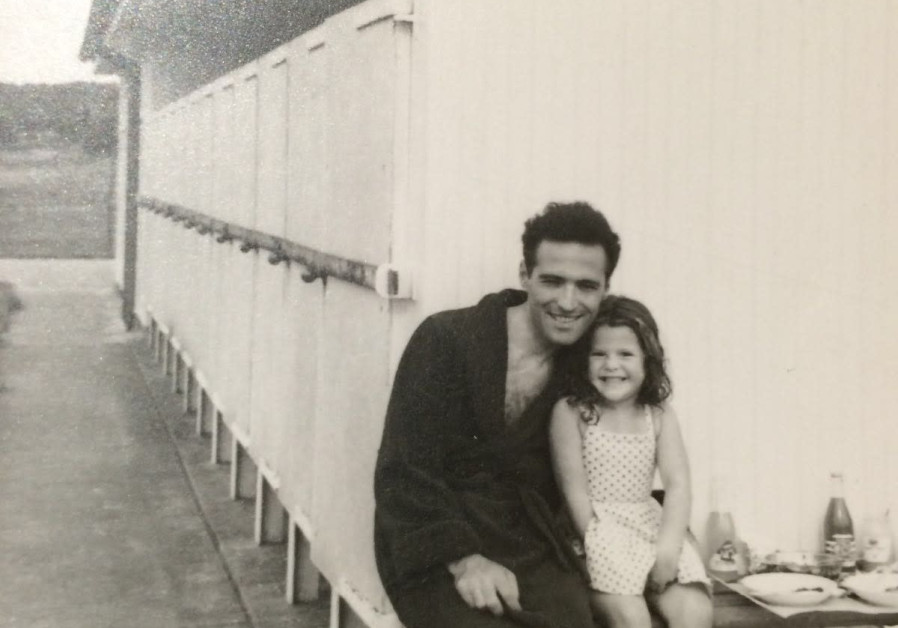 Rebecca Floer as a child with her father. 