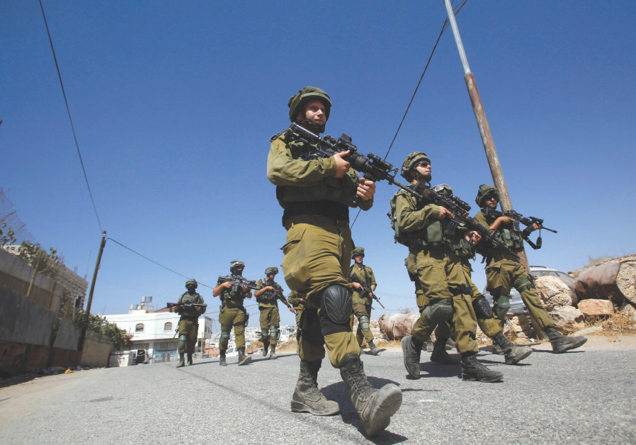 SOLDIERS ON patrol in the West Bank.