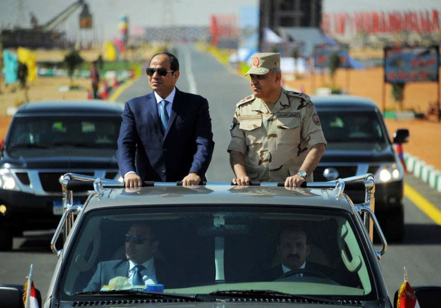 Résultat de recherche d'images pour "Egyptian President Abdel Fattah al-Sisi (L) rides a vehicle with Egypt's Minister of Defense Sedki Sobhi during a presentation of combat efficiency and equipment of the armed forces in Suez, Egypt, October 29, 2017"