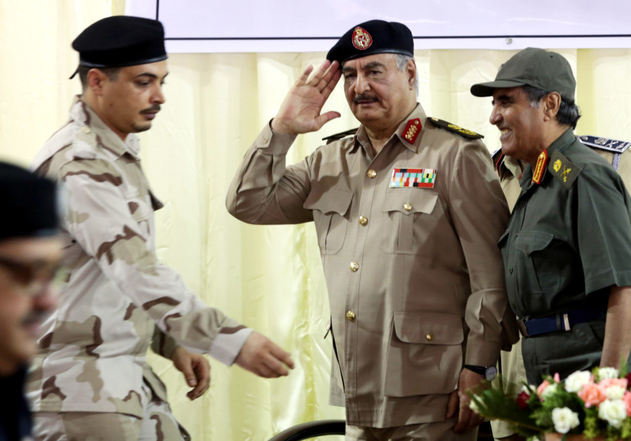 Libya's eastern-based commander Khalifa Haftar salutes as he participates in General Security conference, in Benghazi, Libya, October 14, 2017. (REUTERS/Esam Omran Al-Fetori)