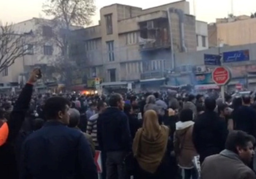People protest in Tehran, Iran December 30, 2017 in this still image from a video obtained by REUTER