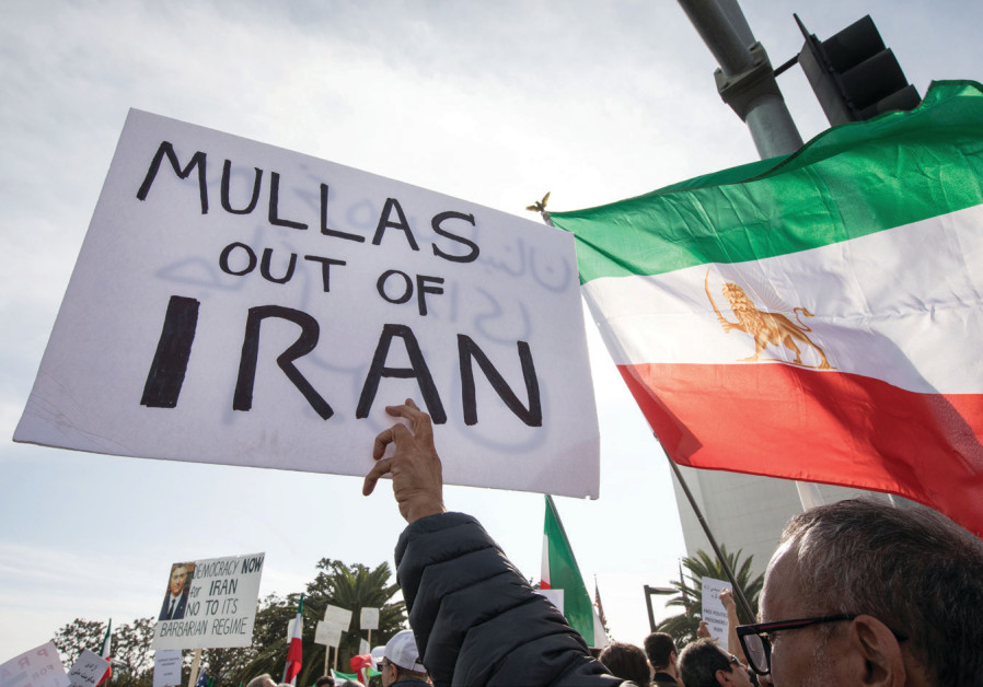 PEOPLE RALLY in support of Iranian anti-government protests in Los Angeles earlier this week