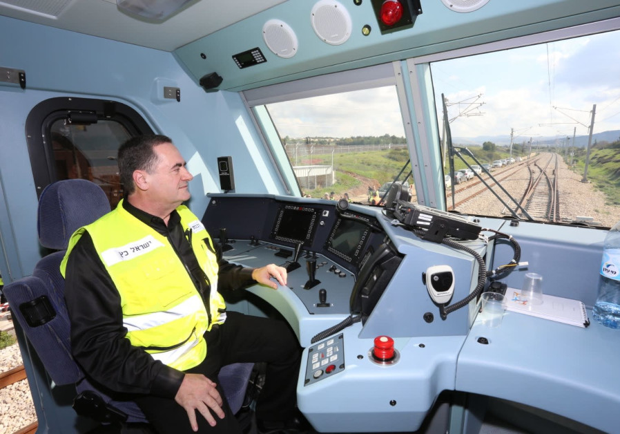 Transportation Minister Israel Katz inside the electric locomotive that hauled test train on January 15, 2018 (Transportation Ministry)