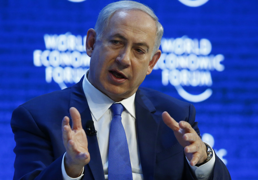 Prime Minister Benjamin Netanyahu attends a session during the 2016 World Economic Forum in Davos