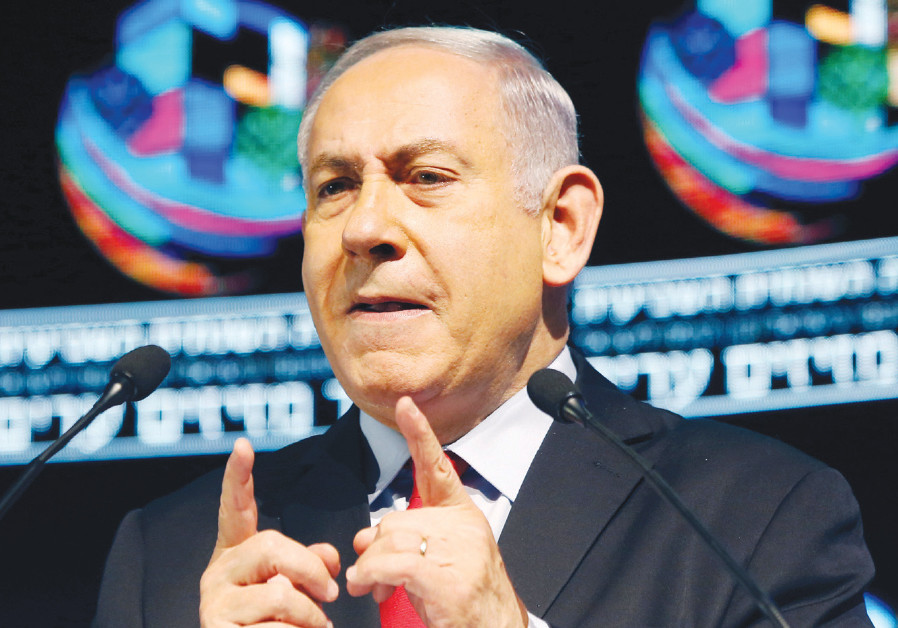 Prime Minister Benjamin Netanyahu addresses a conference in Tel Aviv on February 14