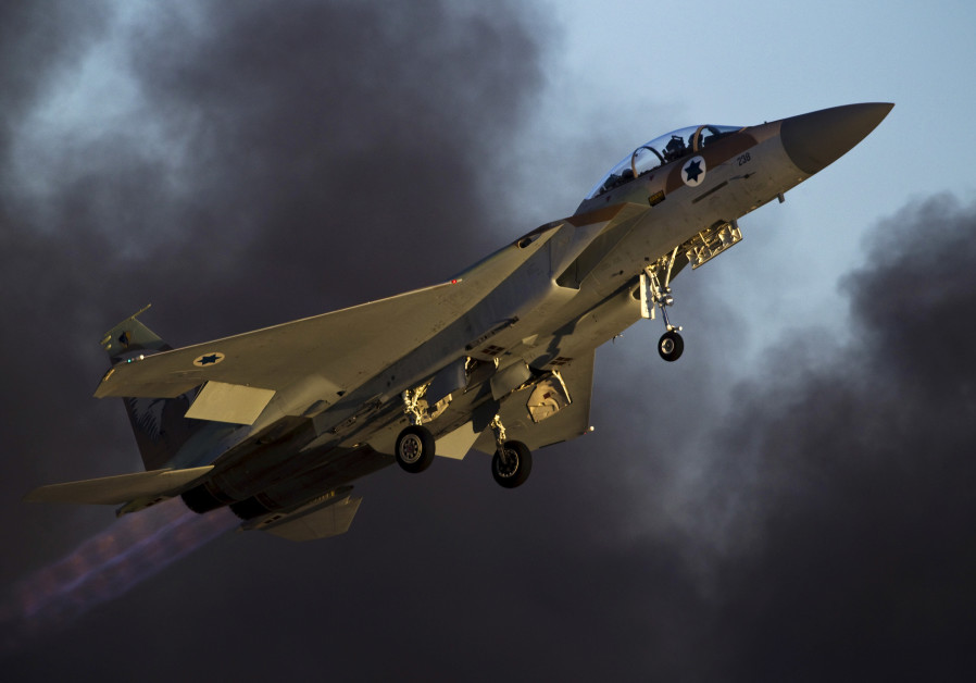 An Israeli air force F-15 fighter jet flies during an exhibition as part of a graduation ceremony 