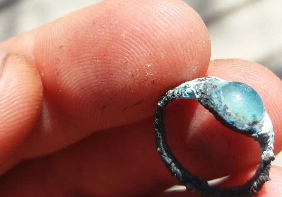 Two-thousand-year-old ring with a solitaire gem stone uncovered in archaeological excavations in the City of David National Park in Jerusalem. (photo credit: CITY OF DAVID)
