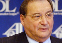 Abraham H. Foxman, National Director of the Anti-Defamation League, shows the book 