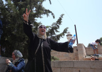 Palestinian women celebrate outside Temple Mount in Jerusalem