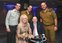 MIRIAM AND Sheldon Adelson pose with IDF soldiers in New York.