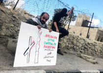 Palestinian protestors react to US President's Trumps declaration of Jerusalem in Bethlehem on the s