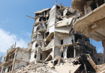 A BOMBED-OUT neighborhood of Homs, Syria, earlier this year
