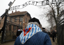 Holocaust survivors enter Auschwitz 73 years after its liberation on Holocaust Remembrance Day, Janu