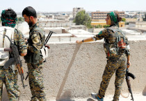 Members of the People’s Protection Units in Raqqa last year.