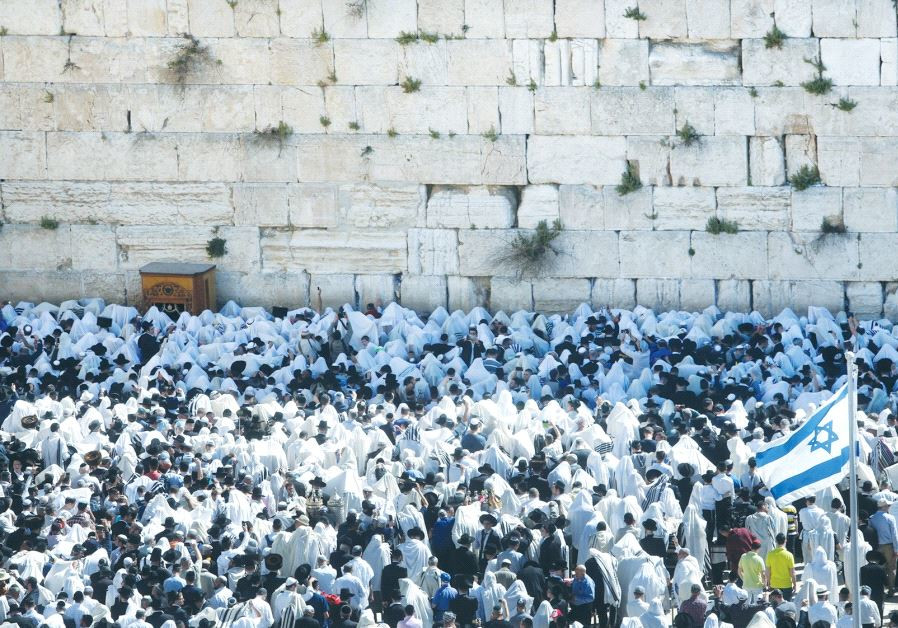 Israel freezes plan for mixed prayer at Western Wall