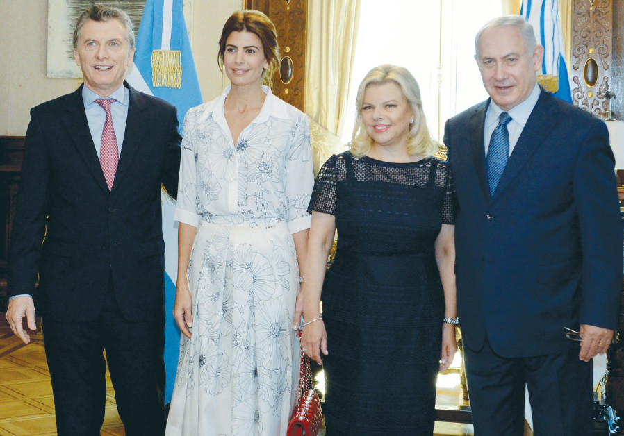 Benjamin and Sara Netanyahu standing next to Argentinian President Mauricio 