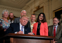US President Donald Trump signs a proclamation, July 17, 2017.