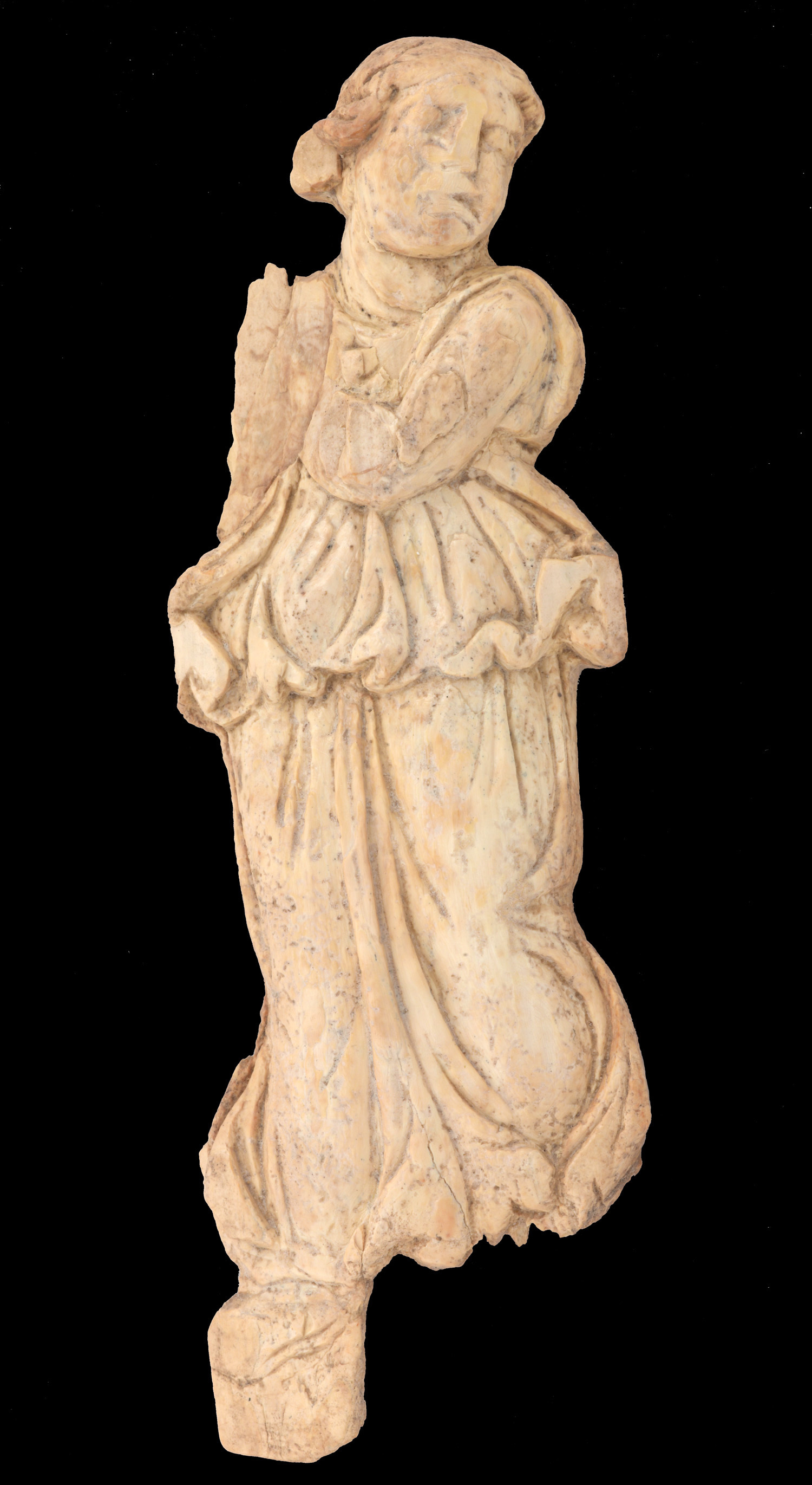 A bone figurine of a woman dancing (COURTESY DR. MICHAEL EISENBERG)