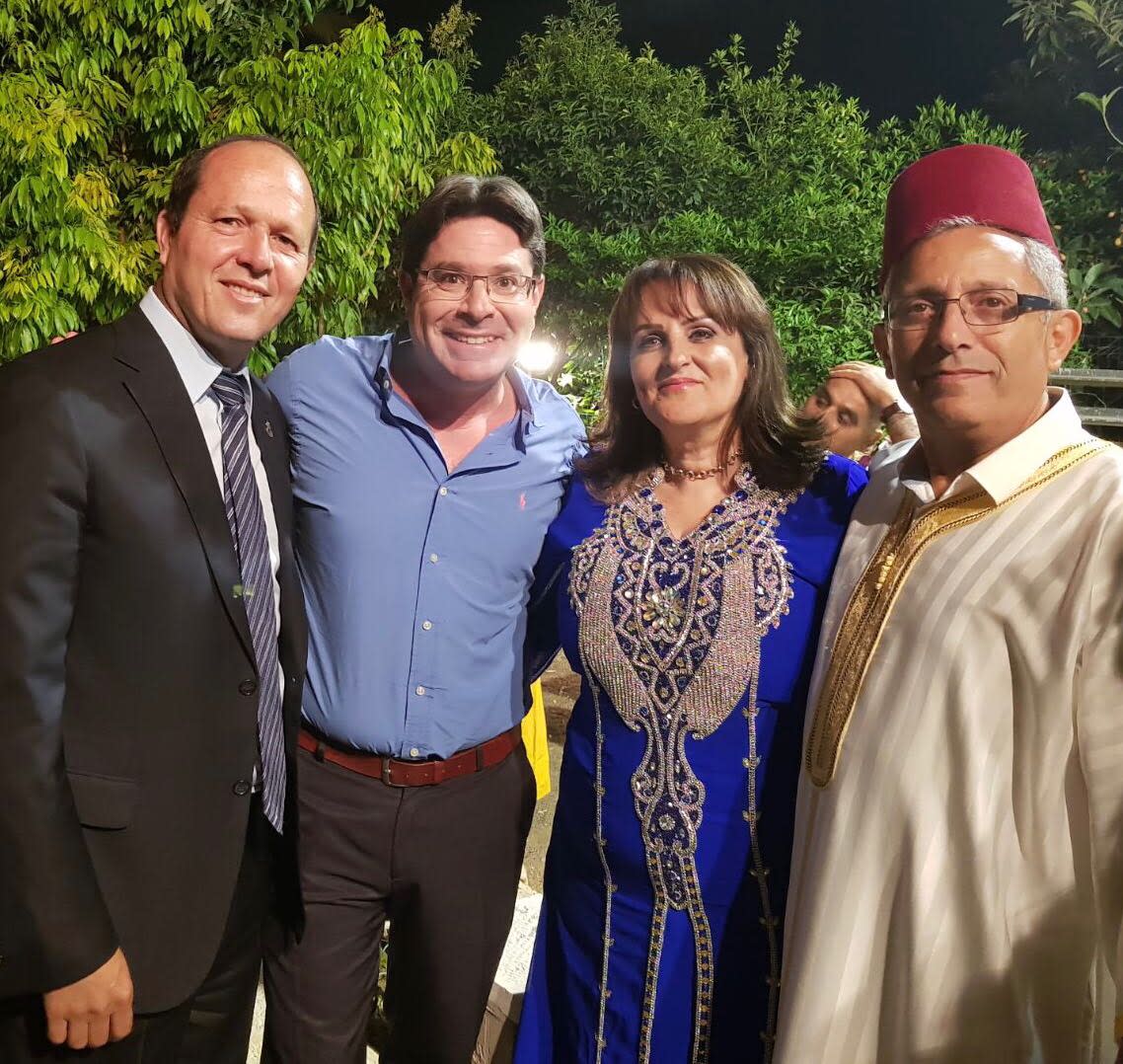 Science and Technology Minister Ofir Akunis and Jerusalem Mayor Nir Barkat at a Mimouna in Beit Shemesh, April 2018 (Courtesy)