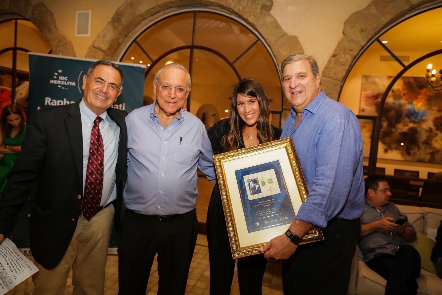 Liron Tzour with Jonathan Davis, Prof. Uriel Reichman, former President and Chairman of the Board of Directors and Oudi Recanati, Chancellor Reichman University at the annual Recanati Gala evening for International students (Credit: Reichman University)