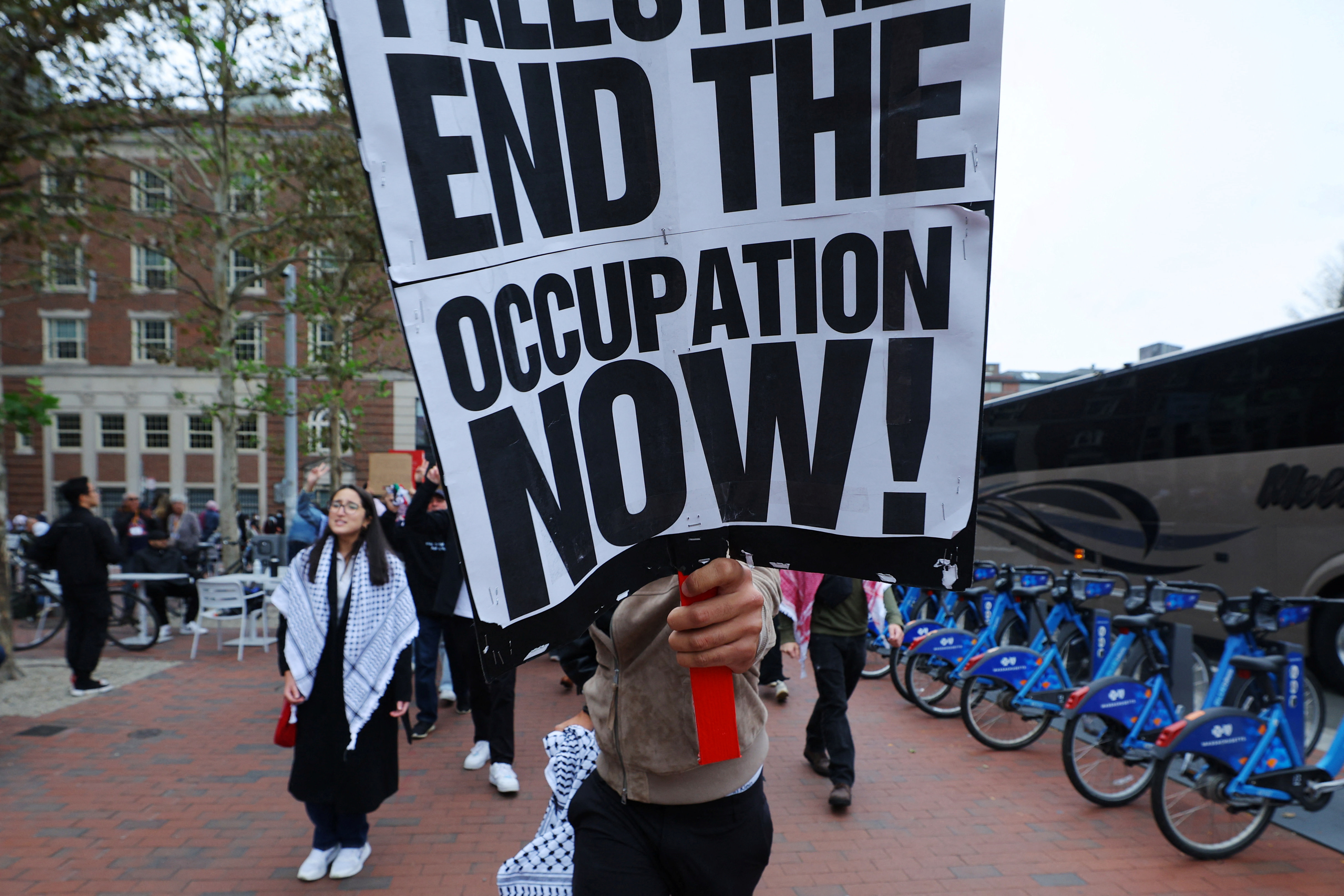 Demonstrators take their “Emergency Rally: Stand with Palestinians Under Siege in Gaza” out of Harvard University and onto the streets of Harvard Square, amid the ongoing conflict between Israel and the Palestinian Islamist group Hamas, in Cambridge, Massachusetts, US, October 14, 2023. (REUTERS/Brian Snyder)