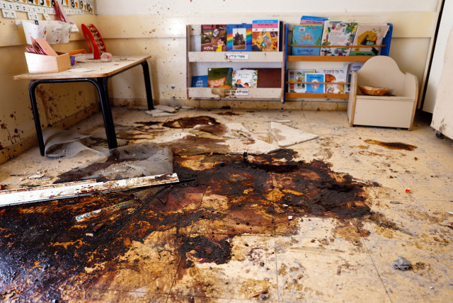 A damaged and blood-stained kindergarten is seen following a deadly infiltration by Hamas gunmen from the Gaza Strip, in Kibbutz Beeri in southern Israel October 22, 2023. (photo credit: REUTERS/AMIR COHEN)