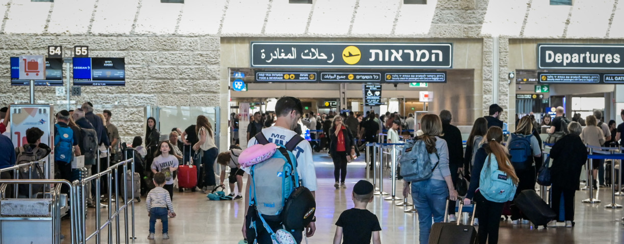  Travelers are seen at the departure hall of the Ben Gurion International Airport on April 4, 2023