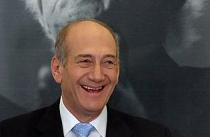 Olmert happy 298.88 (photo credit: AP [file])