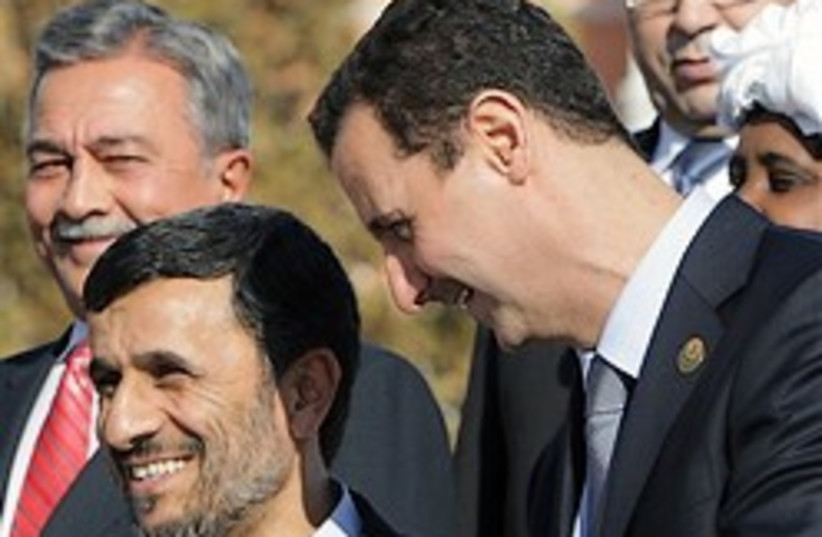 Assad and Ahmedinejad chat 248.88 (photo credit: )