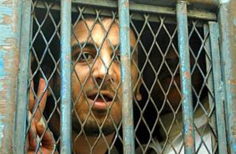 egypt blogger jail 298 (photo credit: AP)