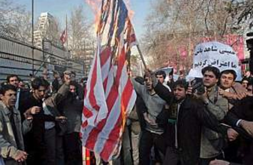iran us flag 298.88 (photo credit: AP)