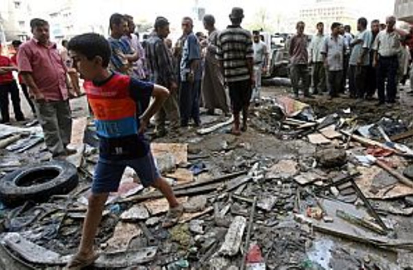 Iraqi bomb aftermath 298 (photo credit: AP)
