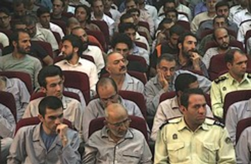Defendants are seen at a court room in Teheran, Sa (photo credit: AP)