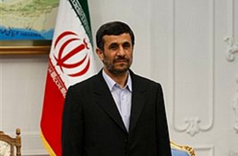 Ahmadinejad flag 248.88 (photo credit: AP)