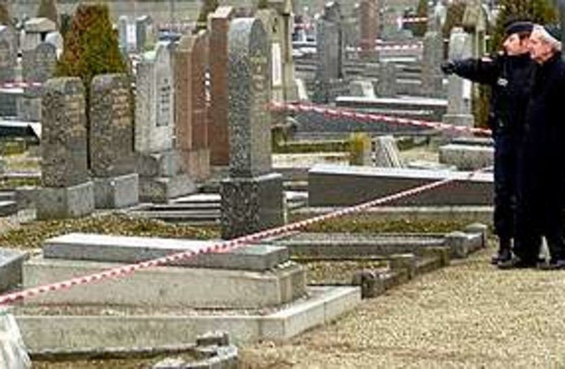 desecrated graves France (photo credit: AP)