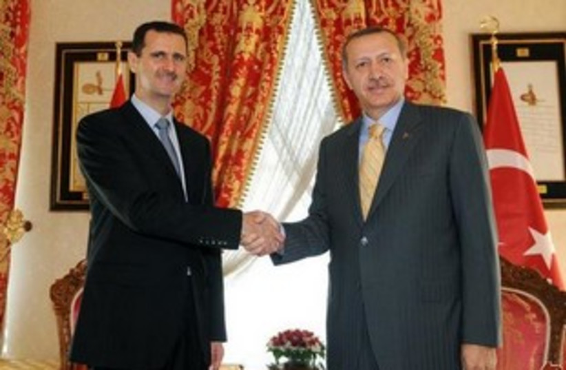 Erdogan Assad  (photo credit: AP)