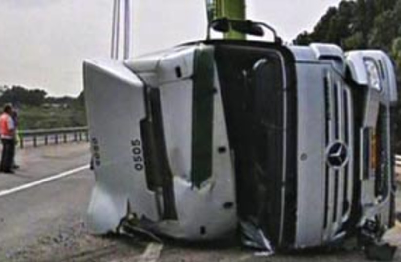 overturned truck 311 (photo credit: Channel 2)
