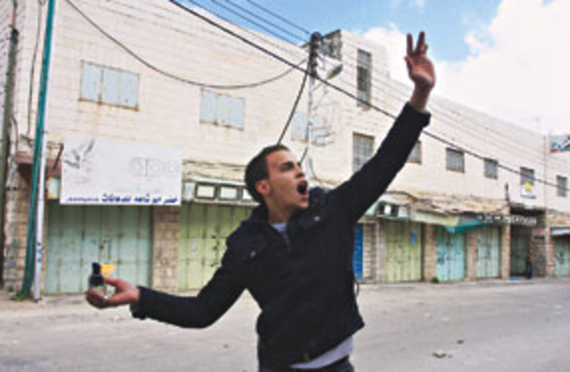 palestinian molotov 311 (photo credit: AP)