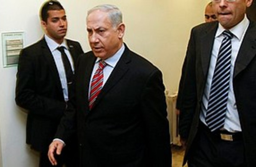 netanyahu arrives at cabinet meeting 311 (photo credit: Associated Press)
