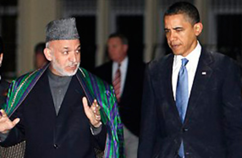 Obama and Karzai 311 (photo credit: AP)