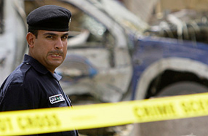 baghdad bomb police 311 (photo credit: AP)