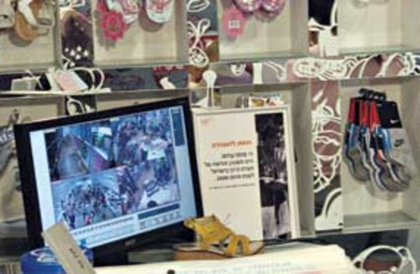 Shoppers behavior is recorded by in-store cameras. 311 (photo credit: ron friedman)