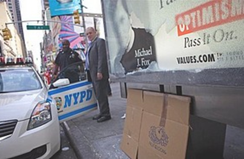 Times square bomb NYPD 311 (photo credit: ASSOCIATED PRESS)
