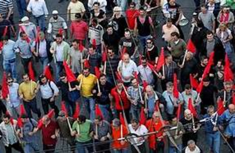 Athens pro communist protest 311  (photo credit: Associated Press)