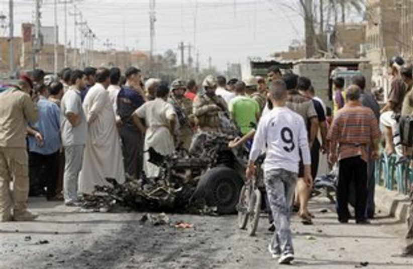 Iraq bomb attack 311 (photo credit: ASSOCIATED PRESS)