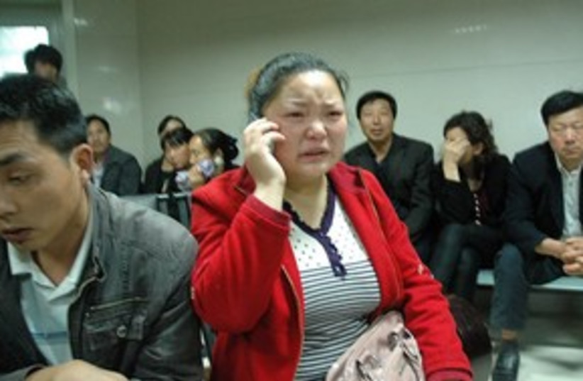 Chinese school attack (photo credit: ASSOCIATED PRESS)