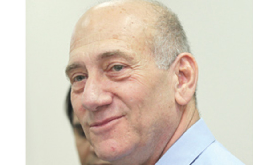 Olmert, smug, with white on the sides 311 (photo credit: Ariel Jerozolimski/The Jerusalem Post)