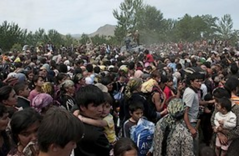 Uzbek refugees from Osh, Kyrgyzstan (photo credit: ASSOCIATED PRESS)