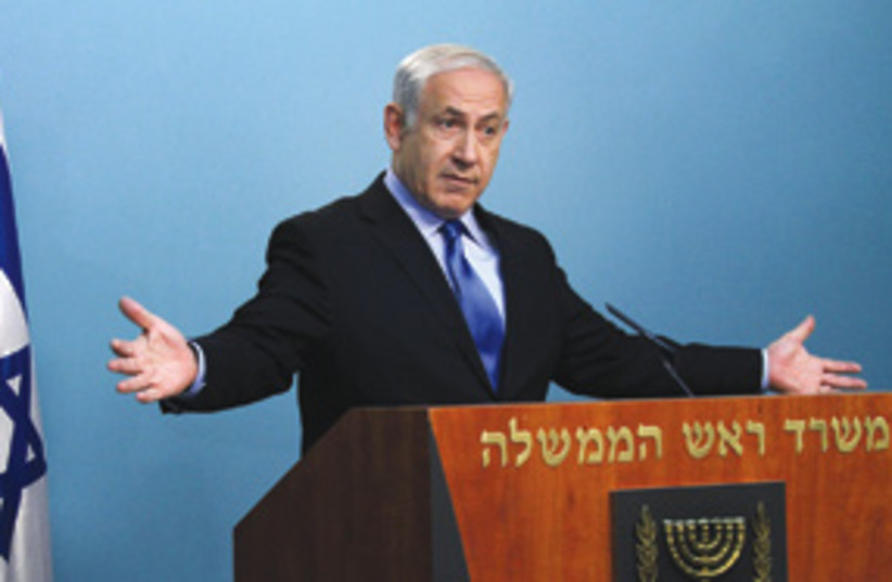 Netanyahu with arms wide open 311 (photo credit: Courtesy)