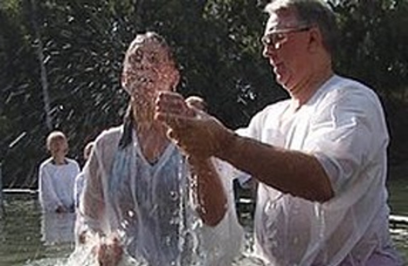 Jordan river baptism (photo credit: First Run Features)